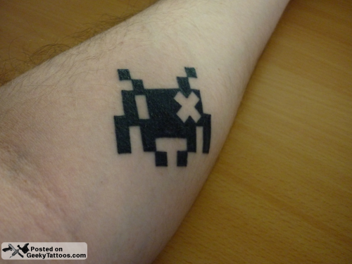 Hooray for pixel tattoos This Space Invader is on Michal's arm