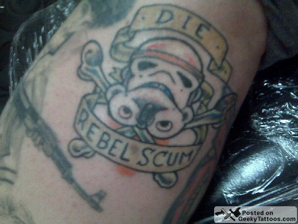 He also has a Flux Capacitor as well as a Die Rebel Scum Stormtrooper tattoo
