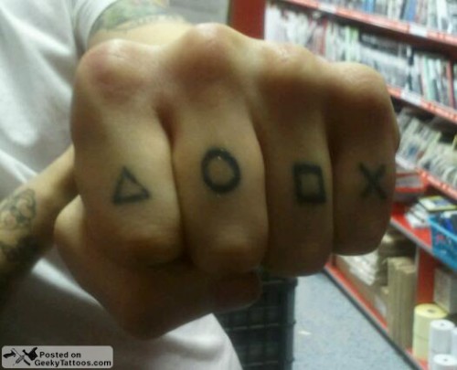 I posted some of the geekiest knuckle tattoos out there already